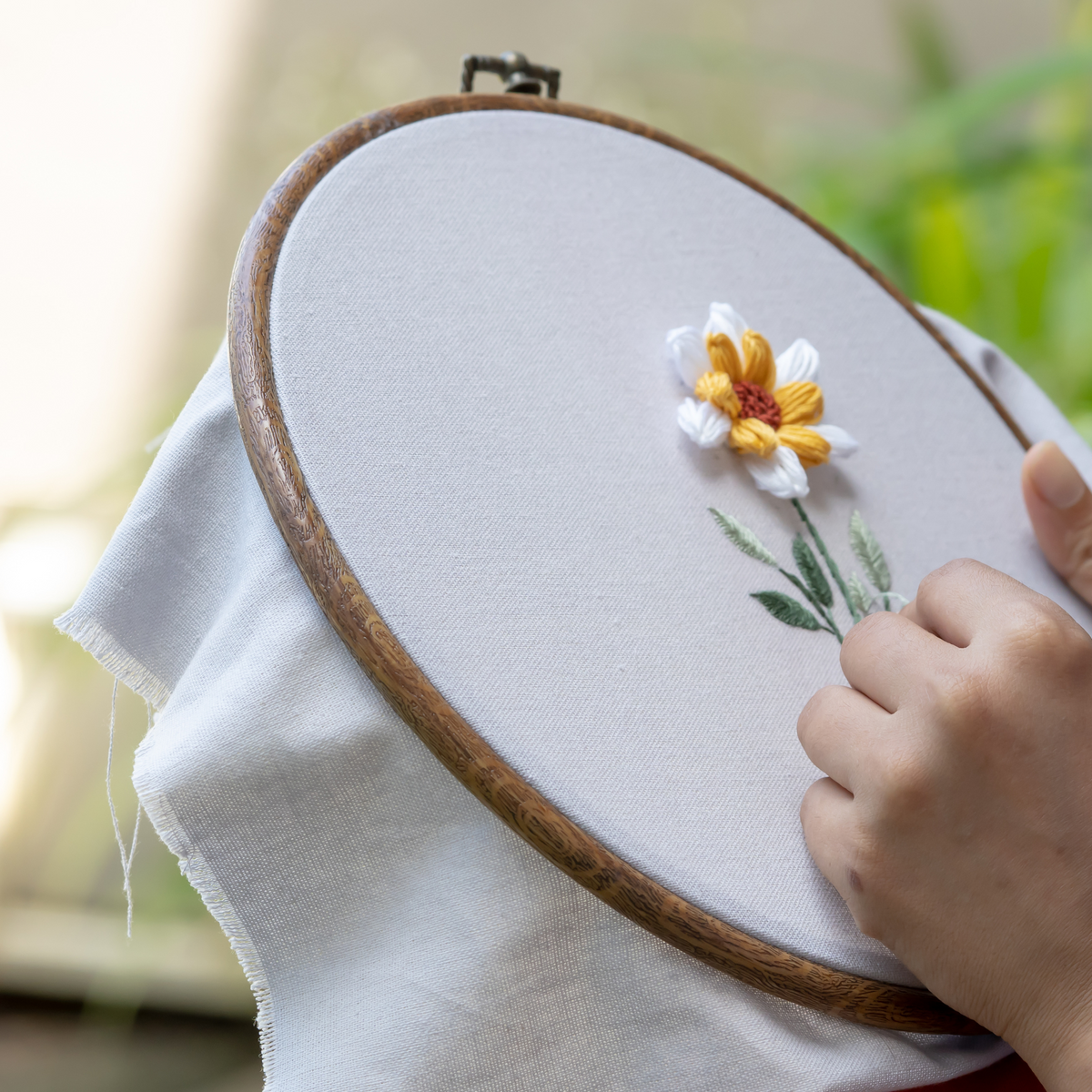 Hand embroidery of a yellow flower in a hoop with text overlay: “Cottagecore, But Make It Personal – Keepsakes You’ll Actually Treasure.”