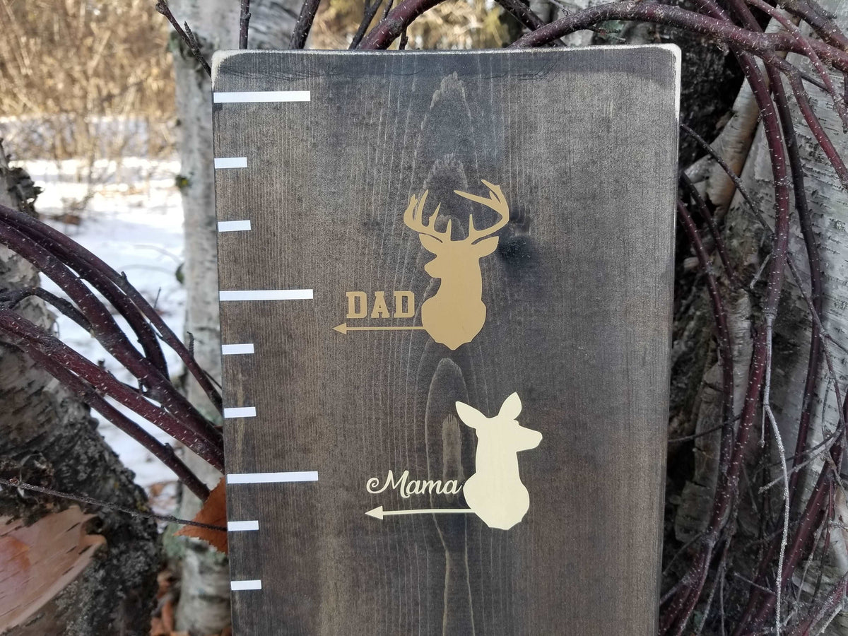 A wooden growth chart with Deer Height Marking Arrows by Little Prairie Craft Co.