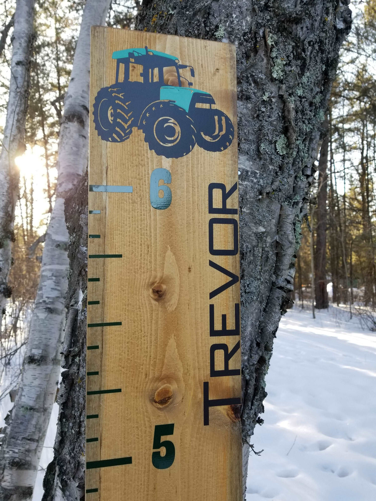 A "Add a Name to Growth Chart or DIY Decal" by Little Prairie Craft Co, with a tractor on it.