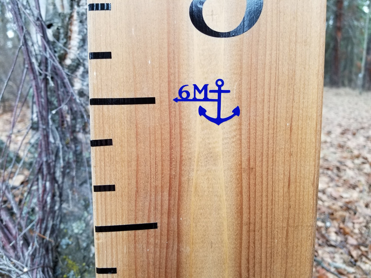 A Sailor Anchor Height Marking Arrows growth chart with an anchor on it, made by Little Prairie Craft Co.