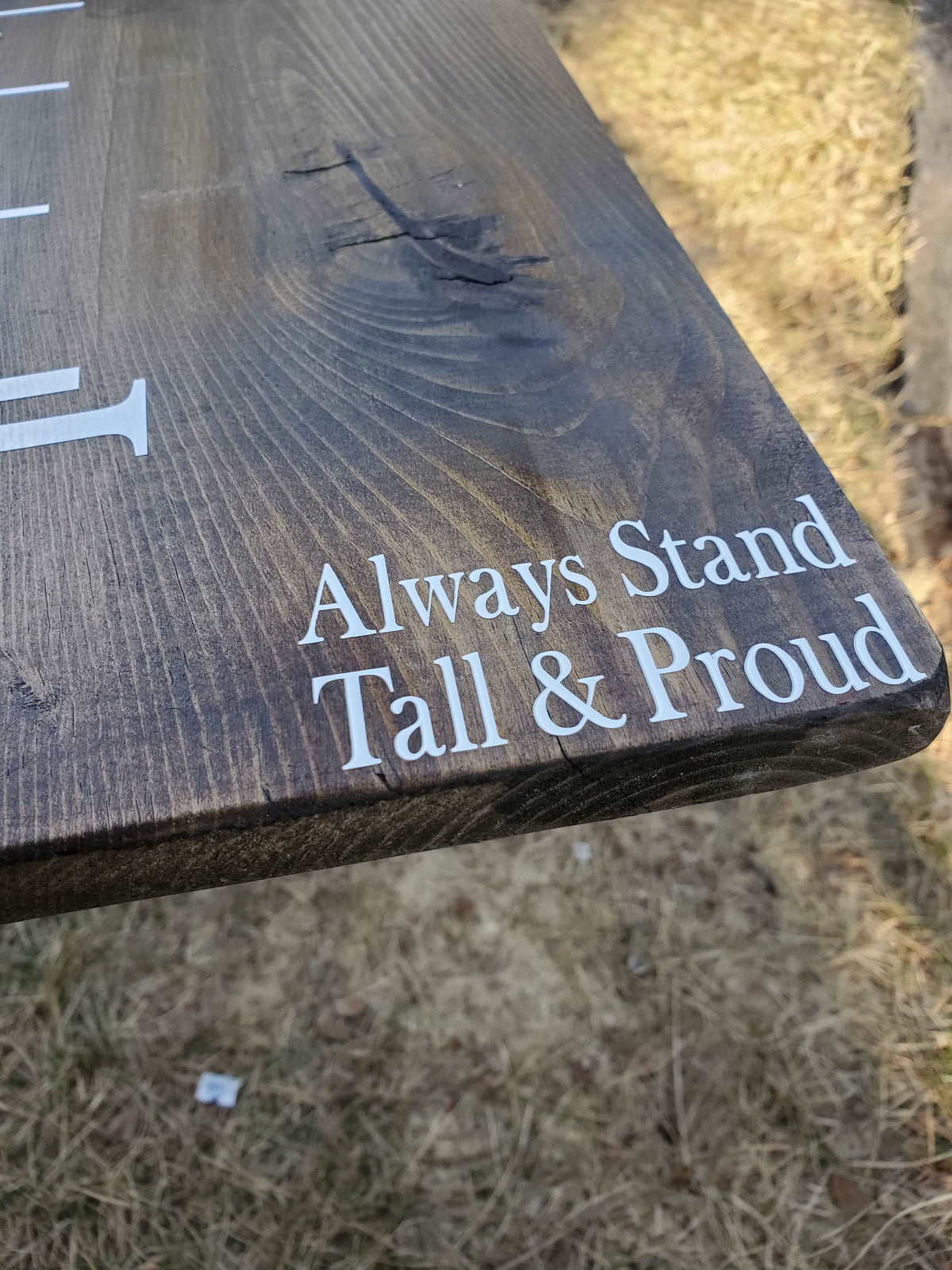 A Little Prairie Craft Co. wooden sign that says Always Stand Tall & Proud Decal.