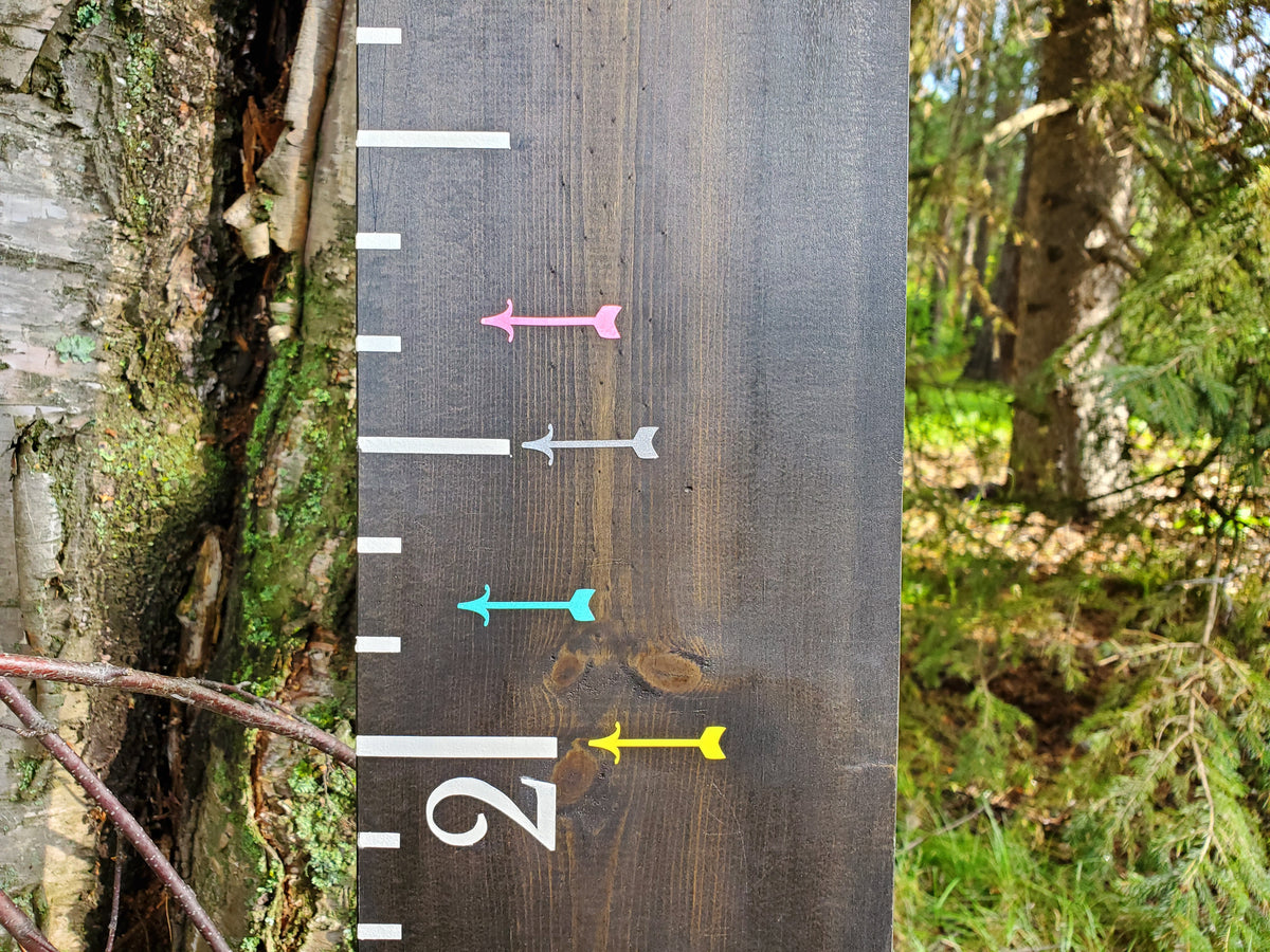 A Lil Mini Fancy Height Marking Arrows growth chart with arrows on it by Little Prairie Craft Co.