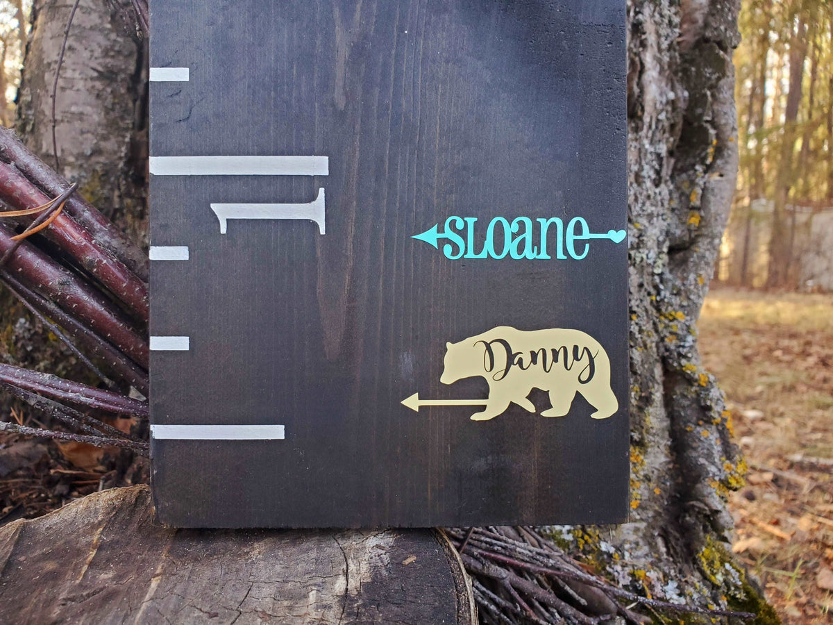 A Little Prairie Craft Co. wooden sign with a bear and Add a Matching Personalized Legend Arrow on it.