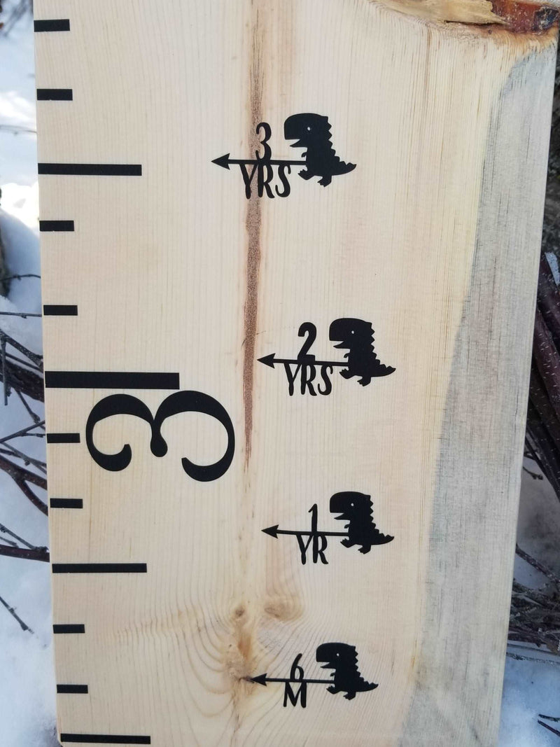 A Cutie Dino Height Marking Arrows wooden ruler from Little Prairie Craft Co.