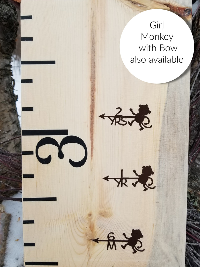A wooden Monkey Height Marking Arrows growth chart with a girl monkey and a tree by Little Prairie Craft Co.