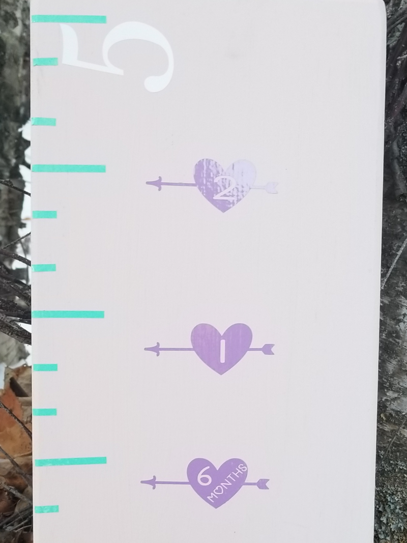 A Little Prairie Craft Co. ruler with Heart Height Marking Arrows on it.