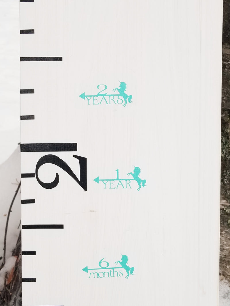 A Unicorn Height Marking Arrows growth chart with numbers on it by Little Prairie Craft Co.