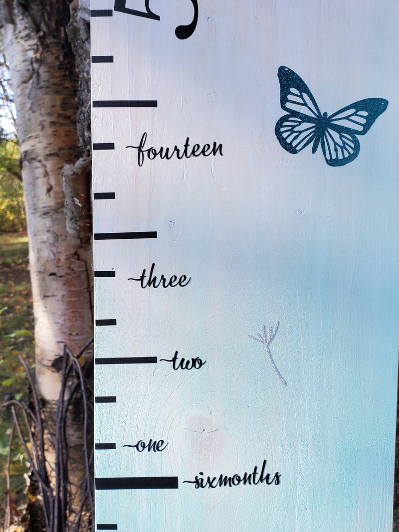 A Little Prairie Craft Co. wooden growth chart with Written Words Height Marking Arrows on it.